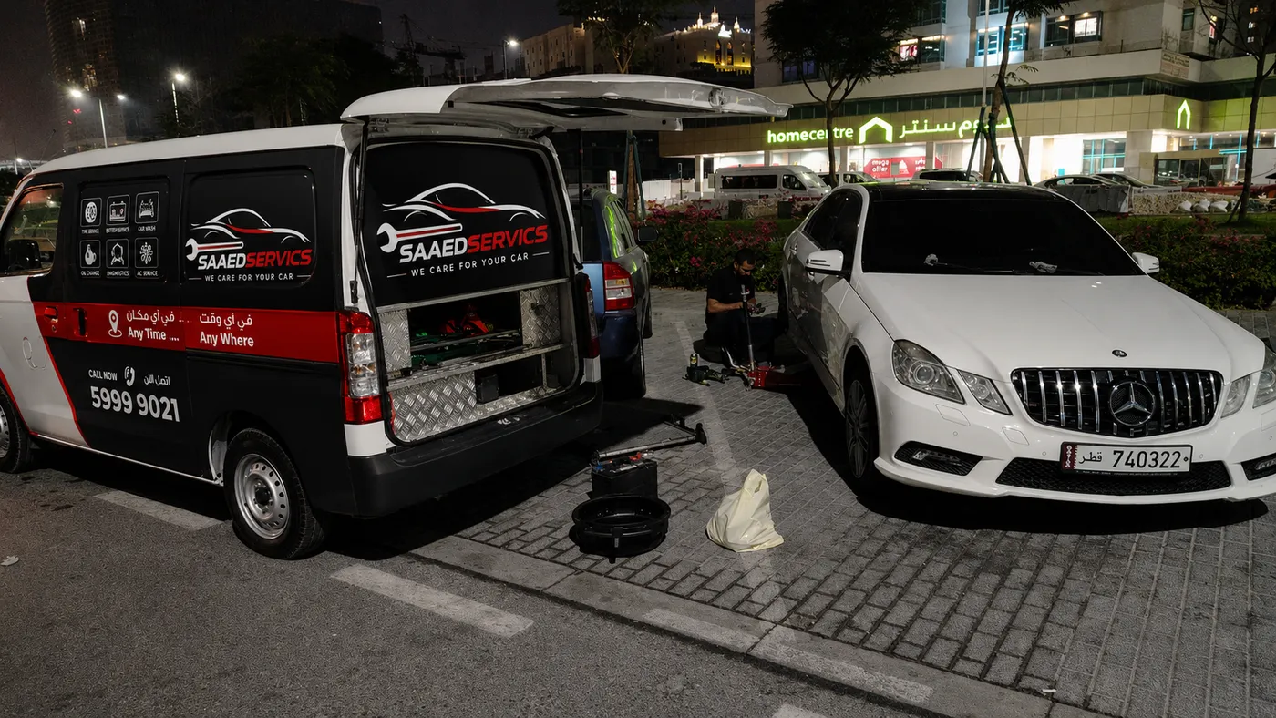 SaaedServics branded mobile workshop van on a night job in Doha